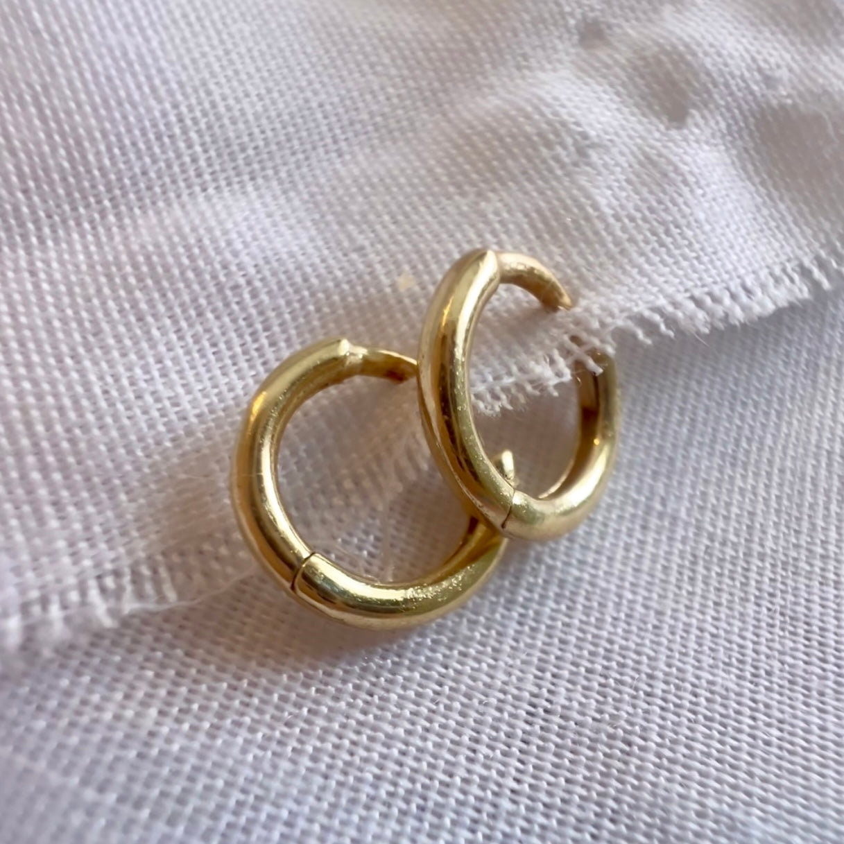 Tiny 8mm gold huggies image 0