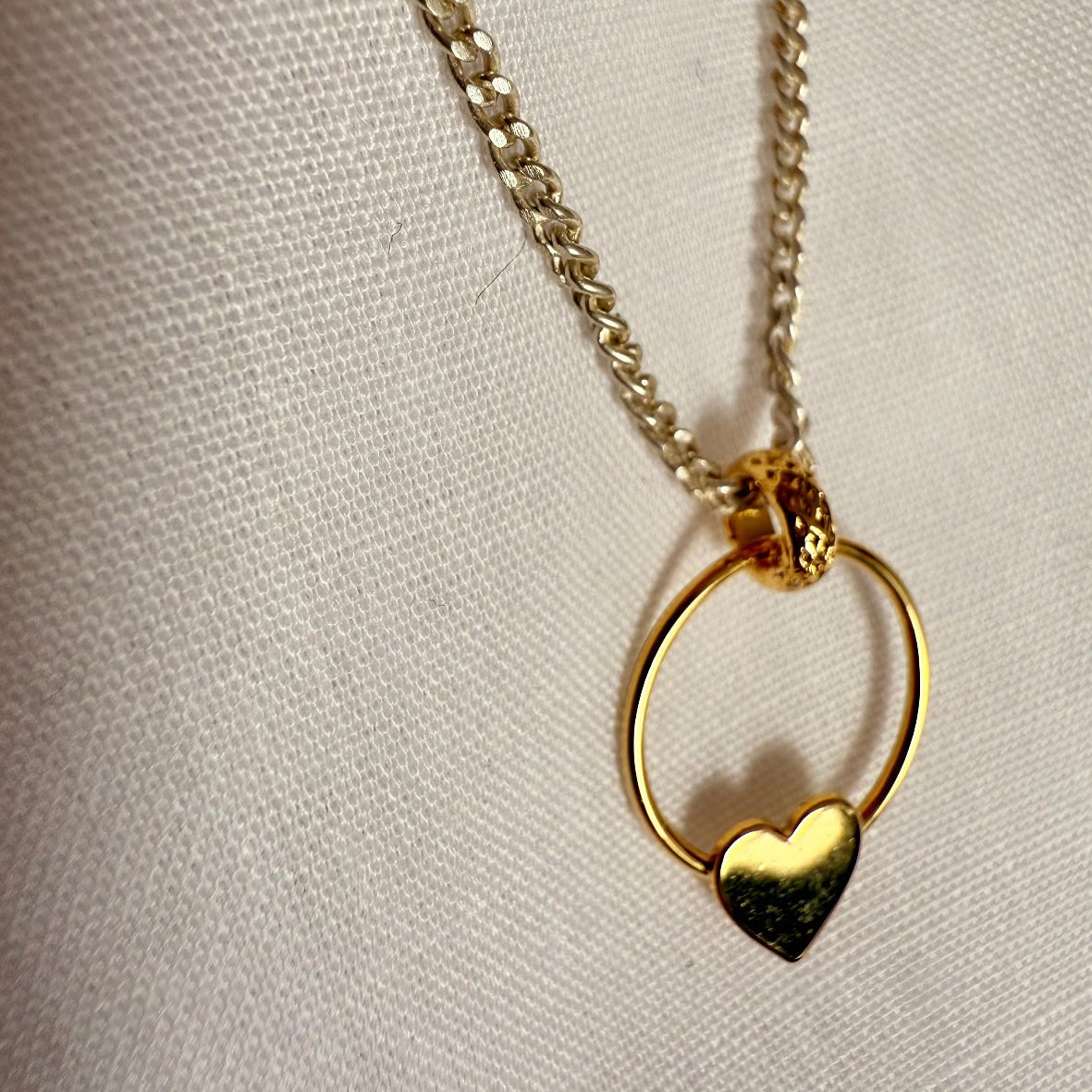 Silver necklace with gold heart door-knocker image 0