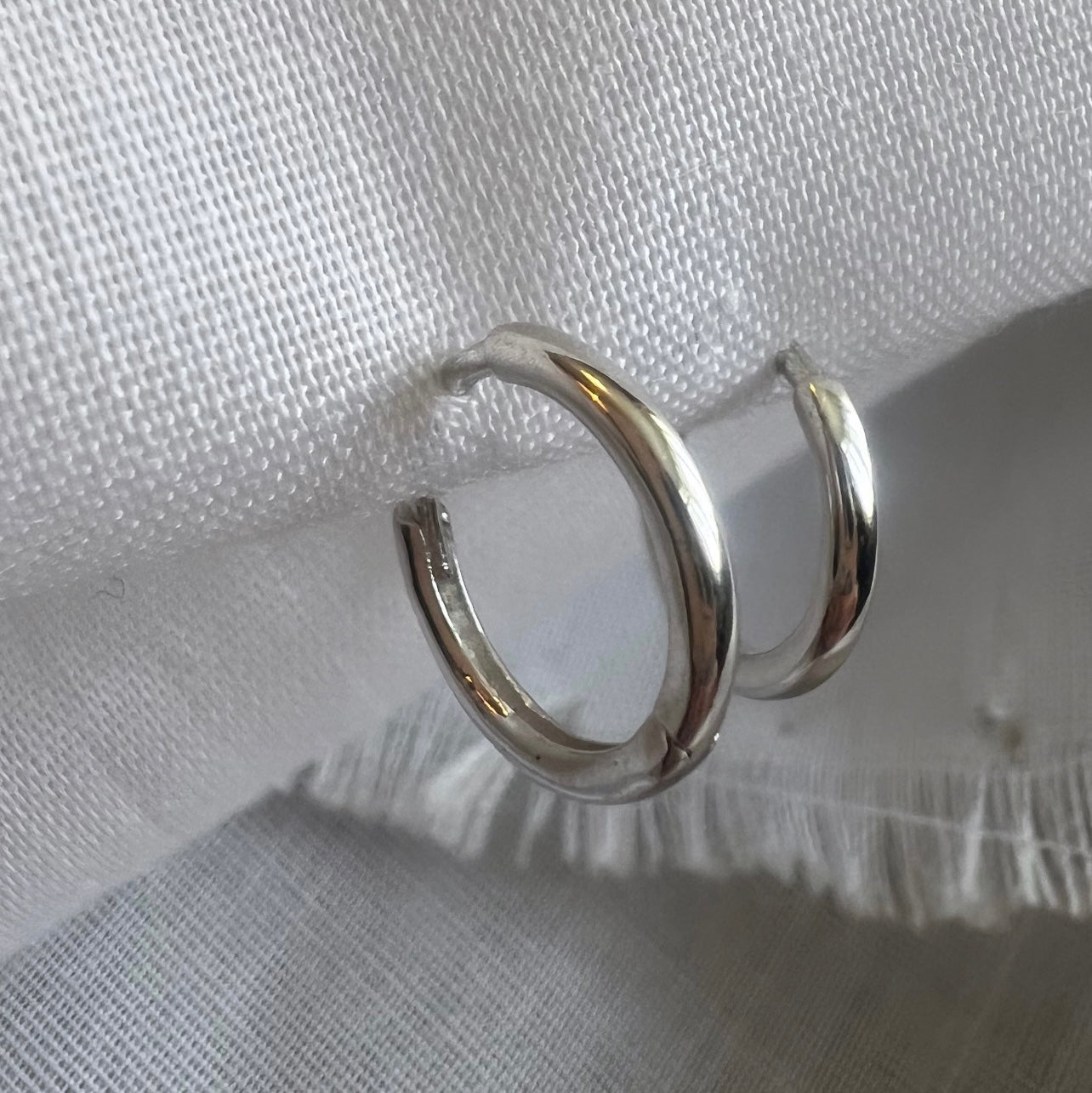 Small 9ct white gold hoops image 0