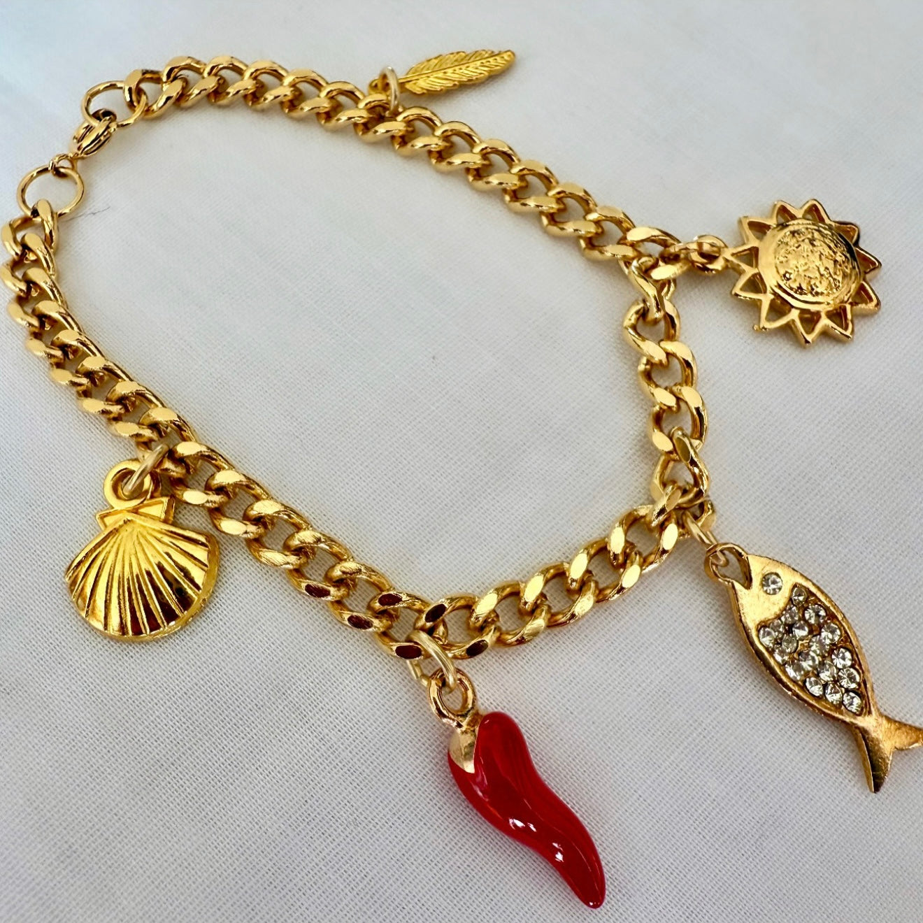 18ct gold plated charm bracelet image 0