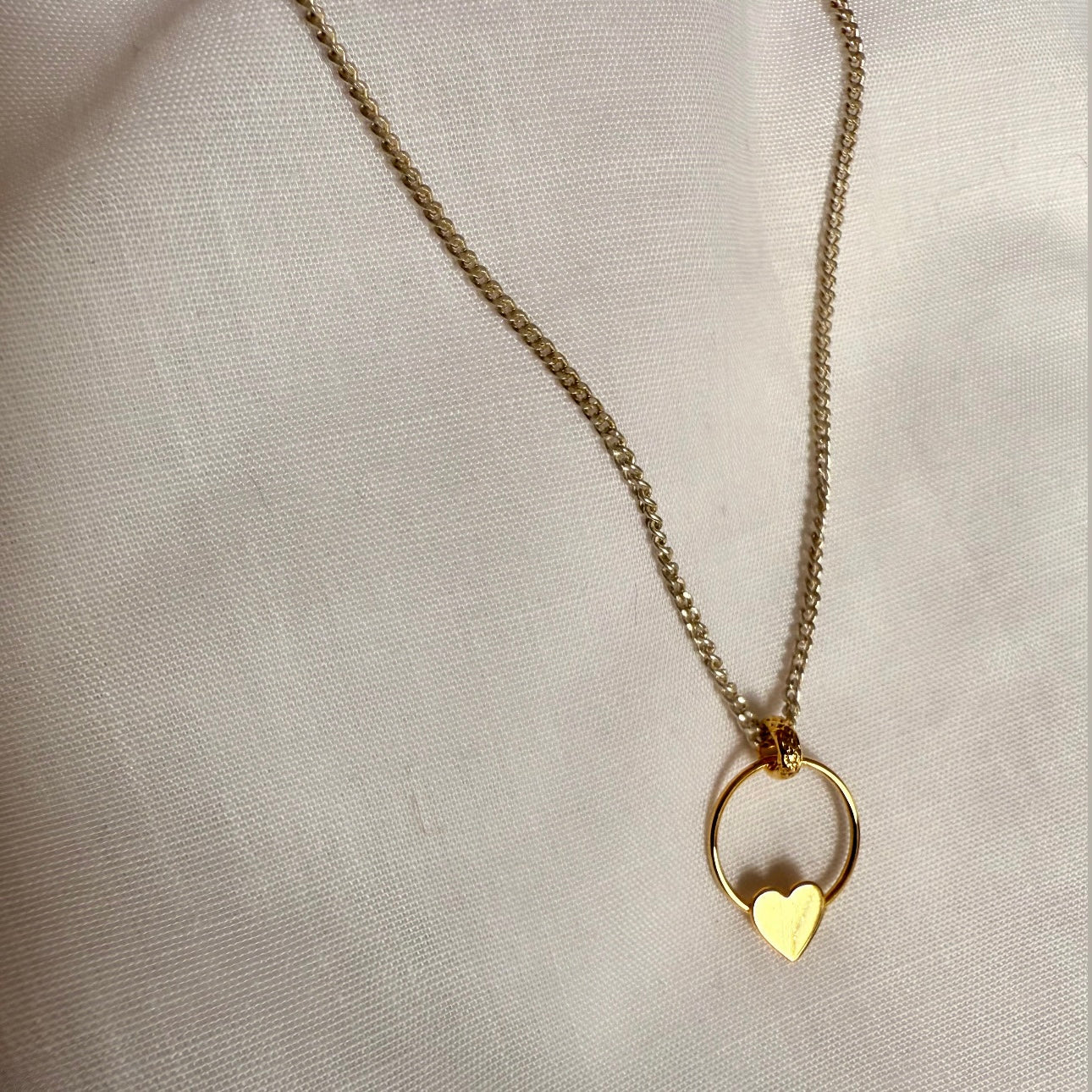 Silver necklace with gold heart door-knocker image 3