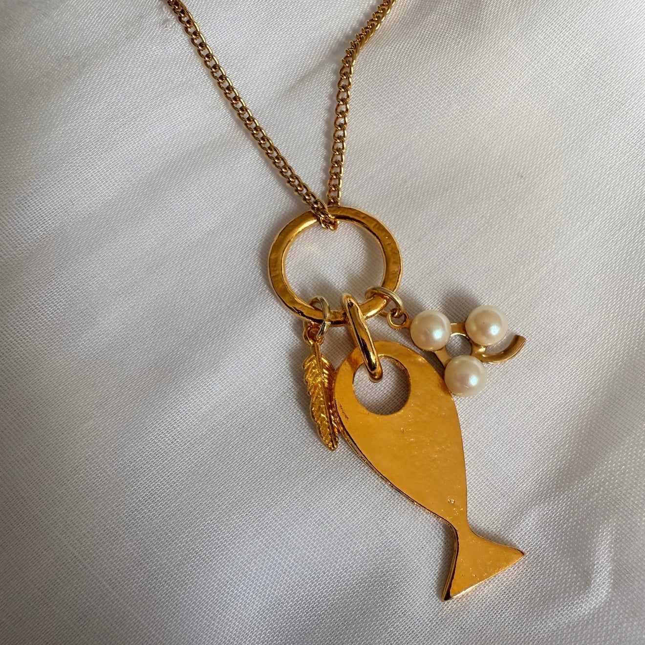 18ct gold plated necklace with fish charm cluster image 0