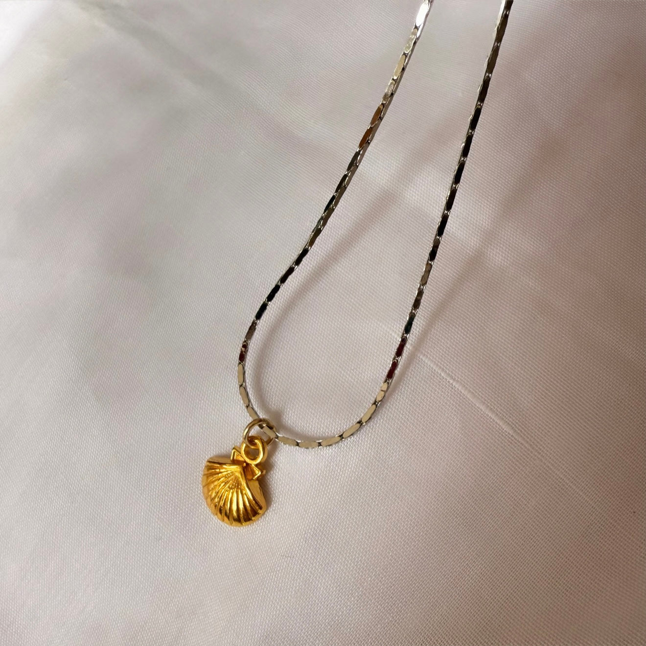 Silver bracelet with gold Seashell image 0